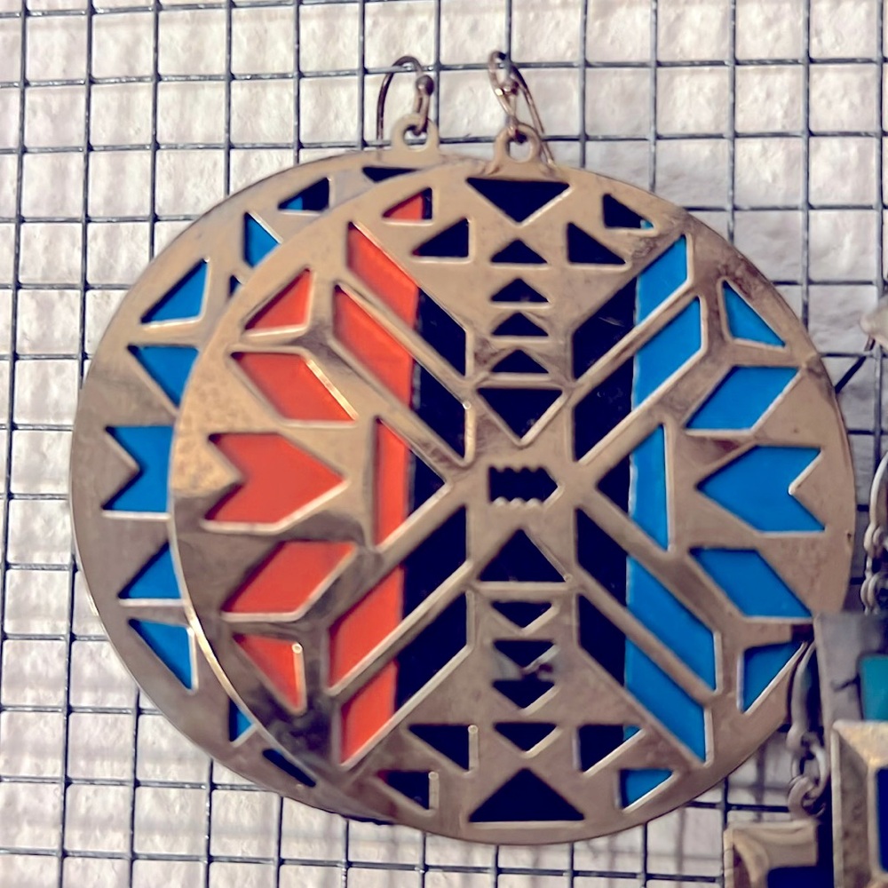 Geometric color blocked dangly earrings with gold plating detail; lightweight